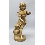 An early 20th century gold painted bronze model of a girl, height 50cm