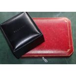 A Cartier gilt tooled red leather cigarette case? box, 15.4cm and a Bulgari jewellery box.CONDITION: