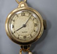 A lady's 1950's 9ct gold Zenith manual wind wrist watch, with case back inscription, on a 9ct