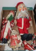 Six Father Christmas figures, 5 early ones holding feather trees and 2 detached from feet, feet