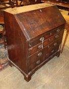 An 18th century walnut bureau, W.92cm, D.50cm, H.100cmCONDITION: The top of the bureau has several