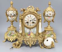 A French gilt metal and porcelain clock garniture, height 32cm