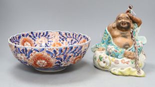 A Japanese kutani figure of Hotei and an Imari bowl, figure H.19cmCONDITION: Objects on the back