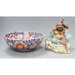 A Japanese kutani figure of Hotei and an Imari bowl, figure H.19cmCONDITION: Objects on the back