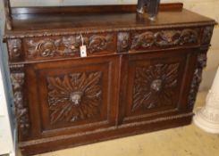 A late 19th century Flemish oak sideboard, W.140cm, D.45cm, H.92cmCONDITION: The top is scratched,