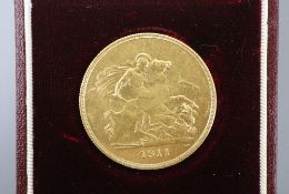 A George V gold £5 coin, 1911, F.