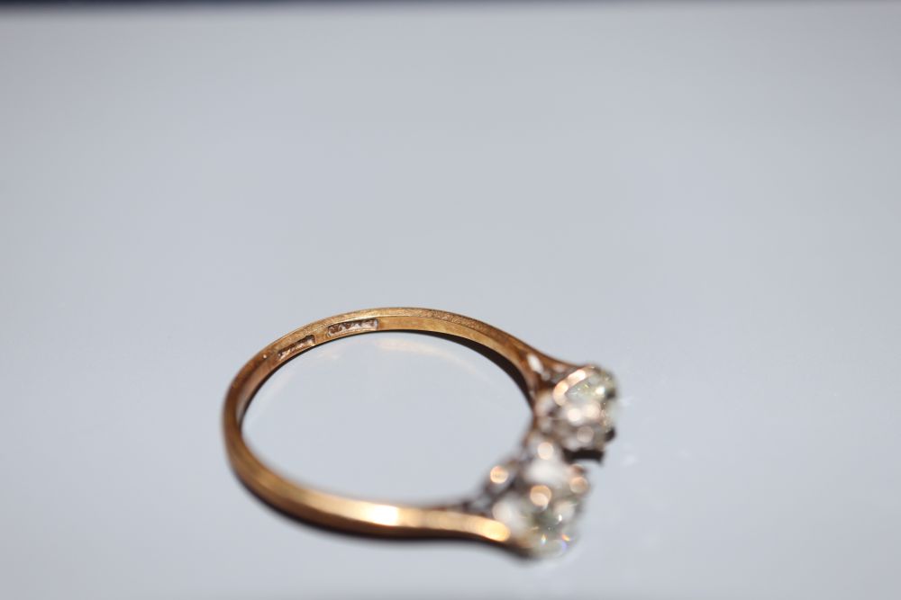 An 18ct and plat, two (ex three) stone diamond ring, size O/P, gross 2.4 grams. - Image 2 of 2