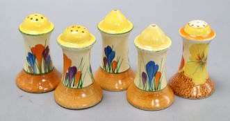 Five Clarice Cliff crocus pattern condiments, tallest 9cmCONDITION: One of the pair has a large chip