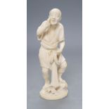 A Japanese Tokyo School carved ivory figure of a fisherman, signed, height 19cm