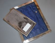An Edwardian silver mounted photograph frame, London, 1906, 24.2cm and a smaller George V silver