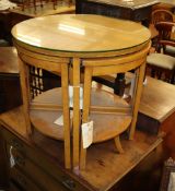 A nest of Art Deco bird's eye maple occasional tables, 60cm diameter, H.58cm