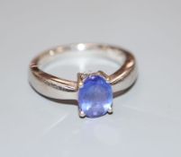 A modern Illana 18ct white gold and oval tanzanite ring, size O.CONDITION: Gross 5.8 grams.