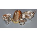 Four assorted silver condiments, a silver sauceboat and a white metal mounted clothes brush.