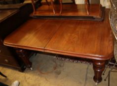 A Victorian mahogany extending dining table, 220cm extended (three spare leaves) W.116cm, H.