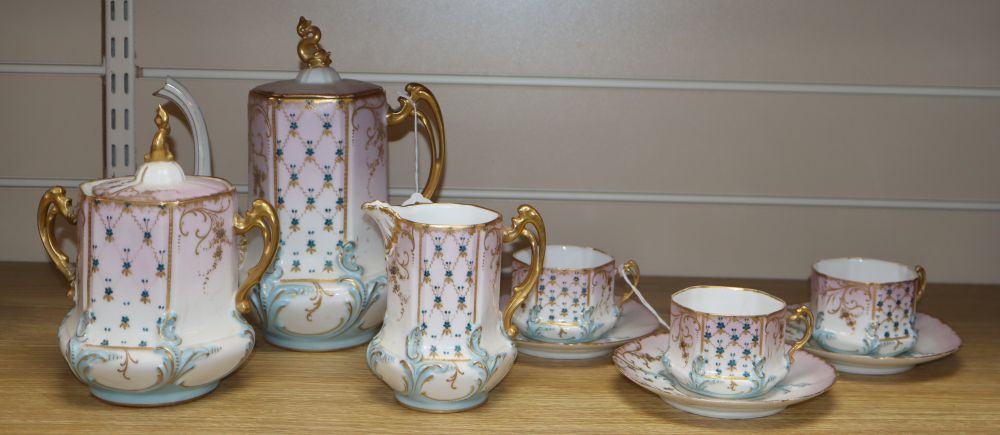 A Limoges porcelain part coffee service, with floral decoration heightened in gilt (9 pieces),