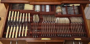 A Maple and Co seventy four piece cutlery set in EPNS