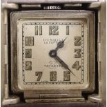 A late 1920's Dunhill La Captive engine turned silver travelling watch, by Tavannes Watch Co. with