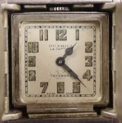 A late 1920's Dunhill La Captive engine turned silver travelling watch, by Tavannes Watch Co. with