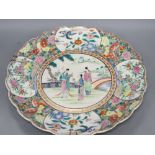 A Japanese famille rose charger, diameter 37cmCONDITION: Two cracks, several light scuffs and