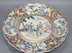 A Japanese famille rose charger, diameter 37cmCONDITION: Two cracks, several light scuffs and