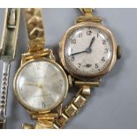 Two lady's 9ct gold cased manual wind wrist watches on gold plated straps, gross 28.9 grams.