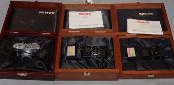 A cased Minox Leica miniature camera, a Minox glass, Contax 1 and a Minox Classic Leica