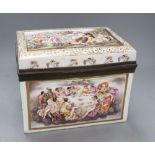 An Italian pottery casket, probably Naples, relief moulded and painted with scenes of revelry and