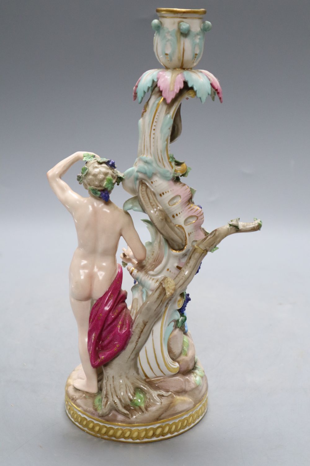 A Meissen 'Bacchus and cherub' candelabrum, 19th century, model no 1190, H. 29cmCONDITION: The - Image 3 of 5
