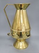 An Aesthetic movement brass communion jug, c.1870, height 49cm