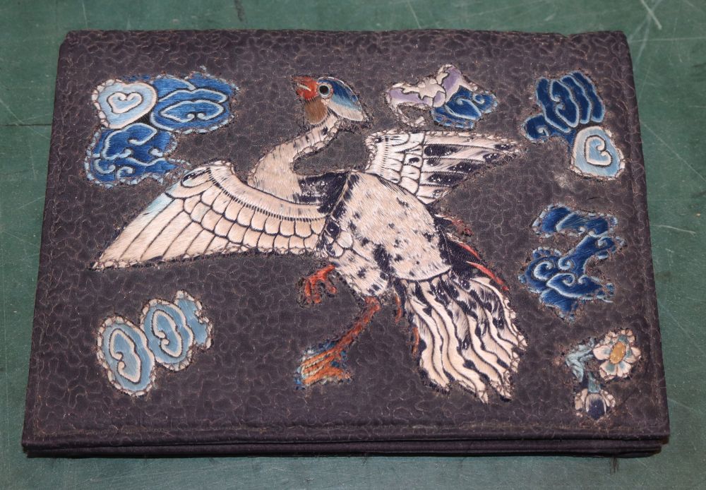 A felt evening bag with Chinese embroidery of a bird