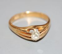 An Edwardian 18ct gold and claw set solitaire diamond ring, size W, gross 6.6 gramsCONDITION: