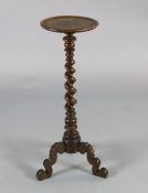 A late 17th century Dutch walnut candle stand, with floral marquetry decorated top and barley