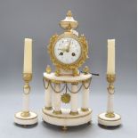 A French Louis XVI style white marble and ormolu four pillar clock garniture, height 35cm