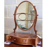 A George III mahogany and boxwood strung swing-frame toilet mirror, W.43cm, D.21cm, H.56cmCONDITION: