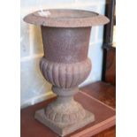 A cast iron campana garden urn, 32cm diameter, H.44cm