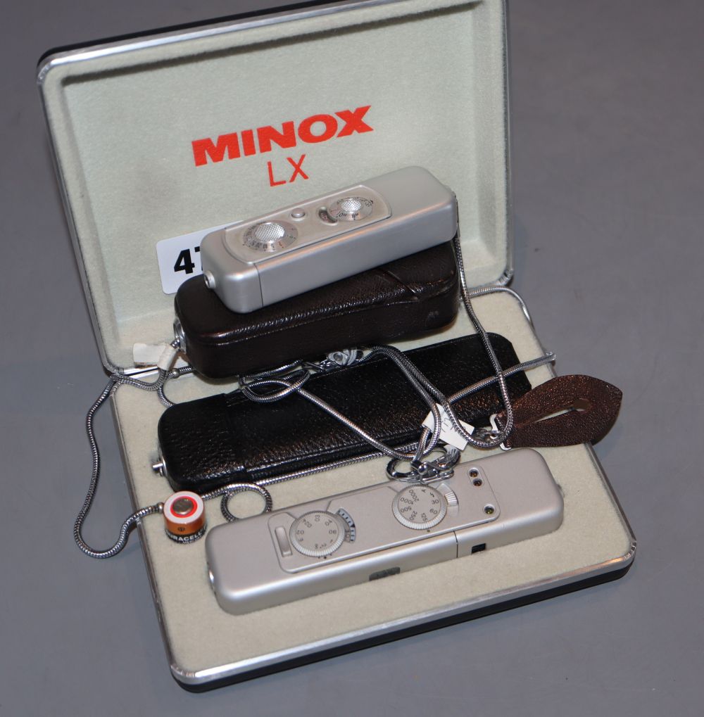 A cased Minox LC camera outfit and 36 exposure camera and case (2)