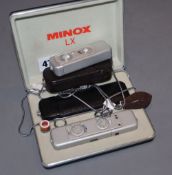 A cased Minox LC camera outfit and 36 exposure camera and case (2)