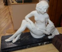 An Art Deco white marble model of a nude and dog, after Chiparus, signed Darcourt, width 62cm height