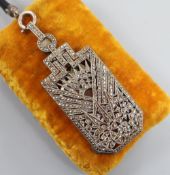 A 1930's Art Deco French white metal and marcasite set lorgnettes pendant, on a fabric necklace,