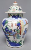 A Chinese Wucai jar and associated cover, height excluding cover 32cmCONDITION: There is a large