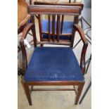 A set of six George III mahogany dining chairs (two with arms)