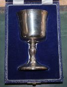 A cased modern silver christening goblet, engraved with a monument?, Courtman Silver Ltd, London,