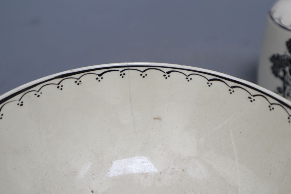 A late 18th century black transfer printed creamware bowl, diameter 14.5cm and two caddies with - Image 2 of 4