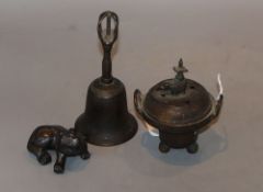 A Chinese Dog of Fo, a bell and a censer