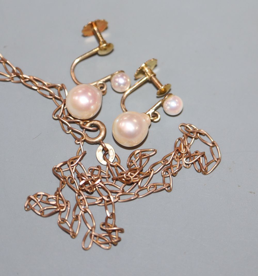 A 9ct gold chain and a pair of 375 and cultured pearl set drop ear clips, gross 5.2 grams.