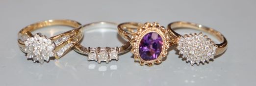 Three assorted modern 9ct gold and diamond set dress rings and a 9ct gold and amethyst ring, gross