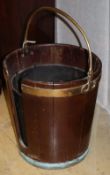 An Irish George III large mahogany plate bucket, brass-bound, 36cm diameter, H.39cmCONDITION: It has