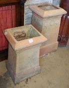 J M Blashfield, Stamford. Two buff chimney pots, c.1880, with roundel decoration, larger W.40cm, D.