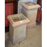 J M Blashfield, Stamford. Two buff chimney pots, c.1880, with roundel decoration, larger W.40cm, D.