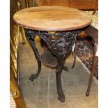 A Victorian style circular cast iron pub table, with mahogany top, 58cm diameter, H.74cmCONDITION: